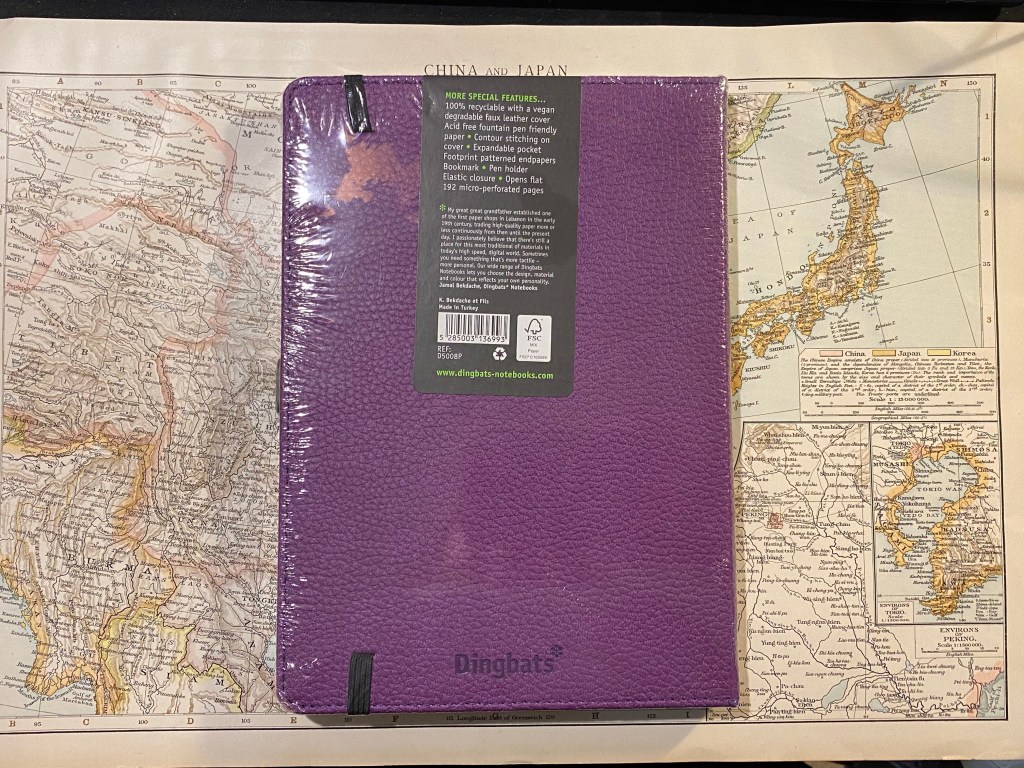 Back cover with a sticker explaining everything there is to know about the notebook. 