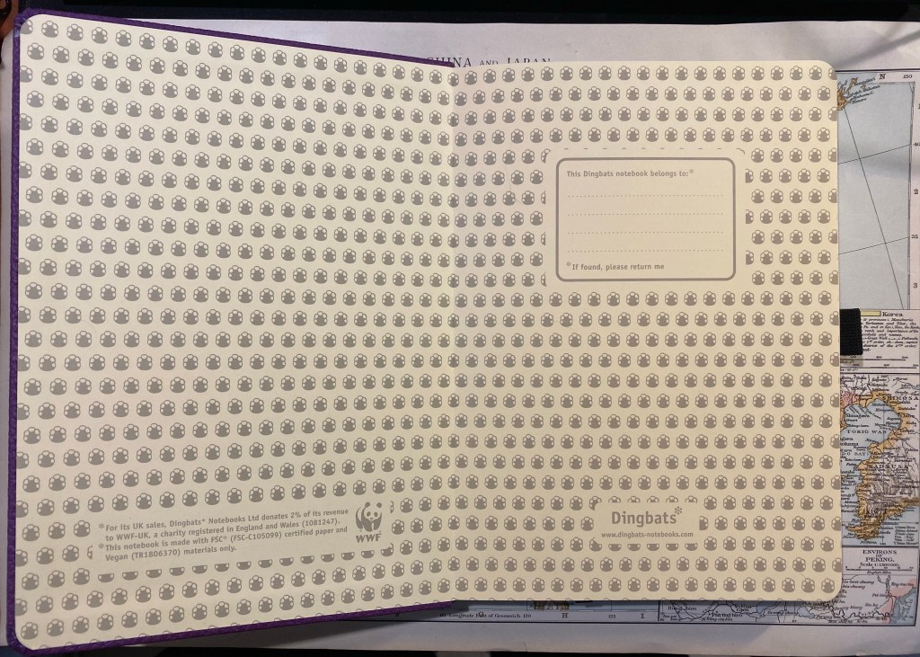 Front endpaper, with notices on the bottom left, logo on the bottom right, a "this notebook belongs to" box in the middle right and a background of hippo footprints, all printed in warm grey. 