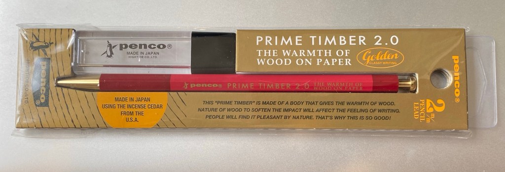 The Penco Prime Timber 2.0 leadholder in red with brass hardware.